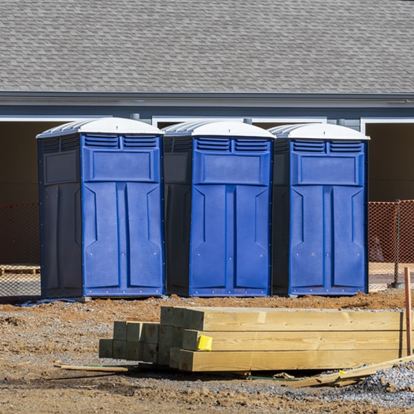 what is the cost difference between standard and deluxe porta potty rentals in Cloud Creek